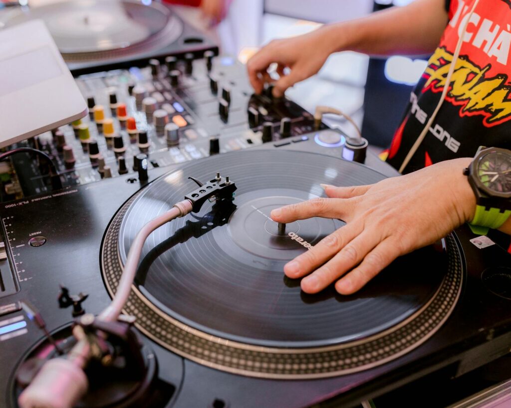 dj spinning vinyl at a music event